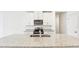 Kitchen island with stainless steel sink, granite countertop and stainless appliances at 2507 Linda Knoll Ln, Bartow, FL 33830