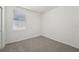 Simple bedroom with neutral carpet, a window, and neutral paint at 2514 Linda Knoll Ln, Bartow, FL 33830