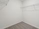 Walk-in closet with carpet and wire shelving for optimal storage and organization at 2514 Linda Knoll Ln, Bartow, FL 33830