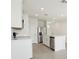 Bright and open kitchen featuring an island with sink, stainless steel appliances, and ample storage space at 2514 Linda Knoll Ln, Bartow, FL 33830