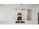 Well-equipped kitchen with stainless steel appliances, white cabinetry, and modern fixtures for cooking convenience at 2514 Linda Knoll Ln, Bartow, FL 33830