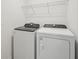 Practical laundry room equipped with a modern washer and dryer set at 2514 Linda Knoll Ln, Bartow, FL 33830