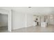 Bright living area with an open floor plan that seamlessly connects to a modern kitchen with stainless steel appliances at 2514 Linda Knoll Ln, Bartow, FL 33830