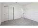 Bright bedroom featuring neutral carpet, with closet doors, offers comfortable living at 2515 Linda Knoll Ln, Bartow, FL 33830