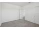 Bright bedroom with neutral carpet, and white walls, creating a fresh and inviting space at 2515 Linda Knoll Ln, Bartow, FL 33830
