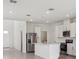 Open-concept kitchen with a center island, stainless steel appliances, and recessed lighting at 2515 Linda Knoll Ln, Bartow, FL 33830