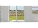 Bright living room with a sliding glass door offers natural light and views of the outdoors at 2518 Linda Knoll Ln, Bartow, FL 33830