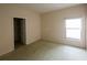 Bedroom with carpet and large window bringing in natural light at 2788 Roccella Ct, Kissimmee, FL 34747