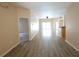 Bright living room featuring wood-look floors and sliding glass doors at 2788 Roccella Ct, Kissimmee, FL 34747