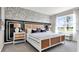 Beautifully decorated bedroom features a decorative wall and stylish furnishings at 2825 Jamaica Way, Haines City, FL 33844