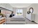 Inviting bedroom features bright natural light, sleek decor, and stylish furnishings at 2825 Jamaica Way, Haines City, FL 33844