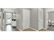Bright hallway with neutral tones, showing a front door view and an office space at 2825 Jamaica Way, Haines City, FL 33844