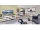 Open floor plan with sight lines to kitchen and dining area, and comfortable living area at 2825 Jamaica Way, Haines City, FL 33844