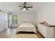Bright bedroom features a ceiling fan, hard wood floors and a closet at 2900 S Semoran Blvd # 4, Orlando, FL 32822