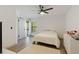 Bright bedroom features a ceiling fan, hard wood floors and a closet at 2900 S Semoran Blvd # 4, Orlando, FL 32822