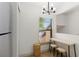 Bright dining nook with modern table, stools, and views from window at 2900 S Semoran Blvd # 4, Orlando, FL 32822