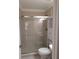 Bathroom with a glass enclosed shower and a white tile floor at 3125 Timucua Cir, Orlando, FL 32837