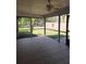 A covered patio area that leads to a fenced in yard at 3125 Timucua Cir, Orlando, FL 32837