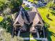 An aerial view of the community's building exteriors and landscaping at 366 Waterside Dr # 102, Altamonte Springs, FL 32701