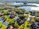 High definition aerial view of the entire community with a lake, tennis courts and green spaces at 366 Waterside Dr # 102, Altamonte Springs, FL 32701