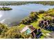 An aerial view of the community pool, exteriors and the large lake at 366 Waterside Dr # 102, Altamonte Springs, FL 32701