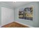 Bright bedroom with a large window and closet at 366 Waterside Dr # 102, Altamonte Springs, FL 32701