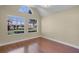 Bright bedroom featuring hardwood floors and natural lighting at 366 Waterside Dr # 102, Altamonte Springs, FL 32701
