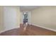 Bedroom with hardwood floors, adjacent to other rooms at 366 Waterside Dr # 102, Altamonte Springs, FL 32701