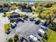 Aerial view of a recreational vehicle and boat parking area available to residents with security fence at 366 Waterside Dr # 102, Altamonte Springs, FL 32701