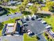 Aerial view of the RV and boat parking lot for residents with paved surface, and secure fencing at 366 Waterside Dr # 102, Altamonte Springs, FL 32701