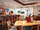 Community bar and dining area features seating, wall decor, and television at 398 Troon Ct, Winter Haven, FL 33884