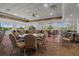 The community dining room has plenty of seating with great views at 398 Troon Ct, Winter Haven, FL 33884