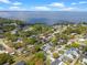 An aerial view of the neighborhood showcasing houses and beautiful lake at 427 N Lakeview Ave, Winter Garden, FL 34787