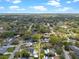 An aerial view of a neighborhood featuring mature trees and homes with pools at 427 N Lakeview Ave, Winter Garden, FL 34787