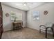 Bedroom featuring plush carpet, ceiling fan, chair and wooden desk at 427 N Lakeview Ave, Winter Garden, FL 34787