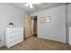 Bedroom featuring neutral walls, ceiling fan, and closet at 427 N Lakeview Ave, Winter Garden, FL 34787