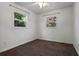 Bedroom featuring carpeted floors, natural light and a ceiling fan at 427 N Lakeview Ave, Winter Garden, FL 34787