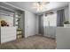 Bright bedroom featuring closet, ceiling fan, and natural light from window at 427 N Lakeview Ave, Winter Garden, FL 34787