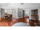 Open concept living and dining room with wood floors at 427 N Lakeview Ave, Winter Garden, FL 34787
