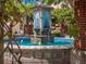 Beautiful mosaic-decorated fountain with cascading water and lush greenery at 427 N Lakeview Ave, Winter Garden, FL 34787
