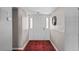 Hallway with a front door with decorative side panels at 427 N Lakeview Ave, Winter Garden, FL 34787
