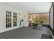 Enclosed patio offering seating and outdoor access, perfect for entertaining guests at 427 N Lakeview Ave, Winter Garden, FL 34787