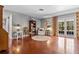 Inviting living room with hardwood floors and french doors at 427 N Lakeview Ave, Winter Garden, FL 34787