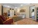 Comfortable living room with a ceiling fan, neutral decor, and seamless flow to other living spaces at 427 N Lakeview Ave, Winter Garden, FL 34787