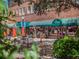 Lively street scene with colorful awnings and outdoor seating areas near local shops at 427 N Lakeview Ave, Winter Garden, FL 34787