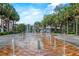 Interactive water fountain area for community enjoyment with palm trees and shade canopies at 427 N Lakeview Ave, Winter Garden, FL 34787