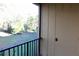 Screened in back porch with view of mature landscaping and storage closet at 429 Sheoah Blvd # 8, Winter Springs, FL 32708