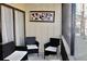 Relax on this cozy screened-in balcony with comfortable seating and stylish decor at 429 Sheoah Blvd # 8, Winter Springs, FL 32708