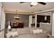 Bright dining area featuring a round table with seating for four, adjacent to the living space and kitchen at 429 Sheoah Blvd # 8, Winter Springs, FL 32708