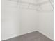 Walk-in closet with carpeted floor and wire shelves at 4337 Switchgrass Ln, St Cloud, FL 34772